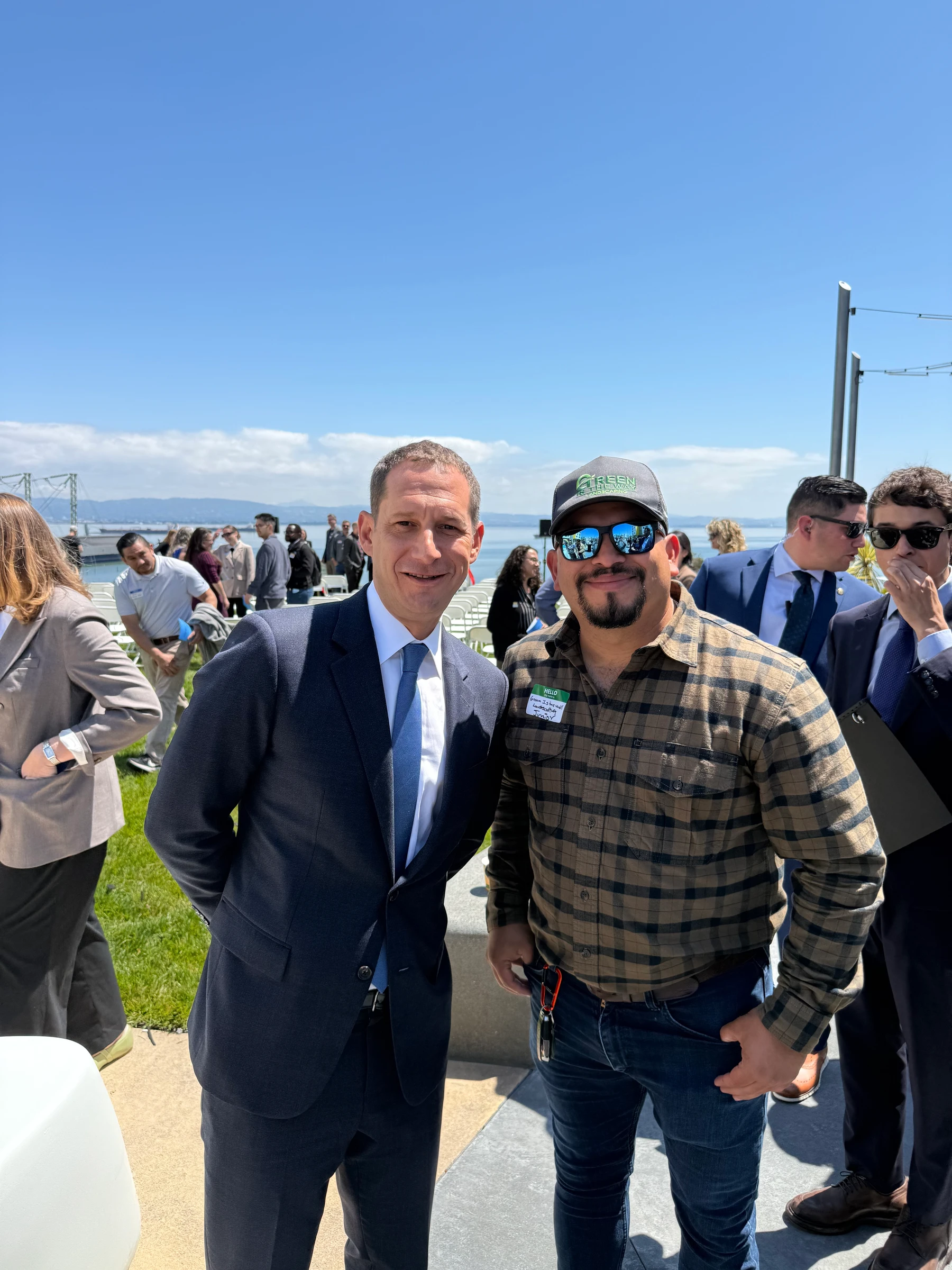 Junior Cabrera with the mayor of San Francisco at a waterfront event